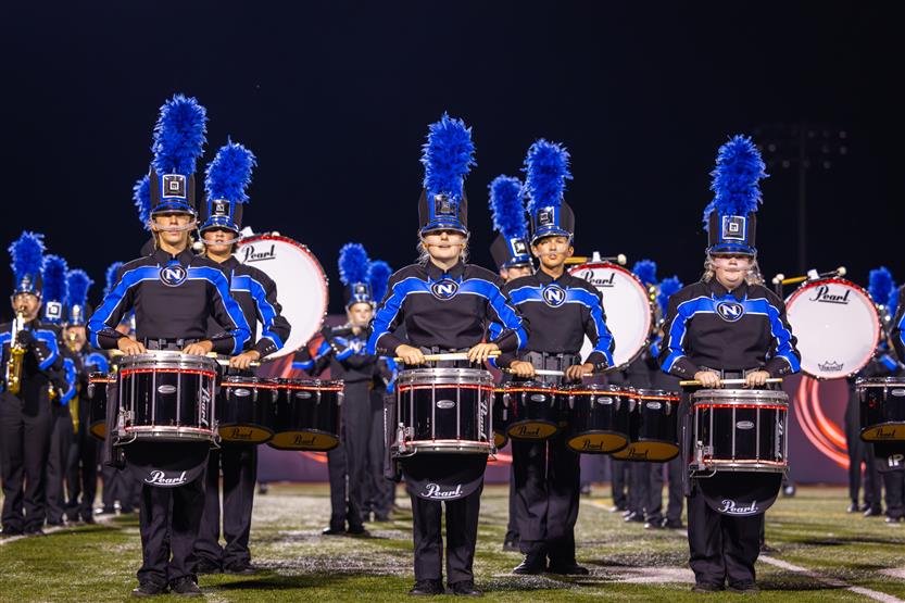 Students perform on football field